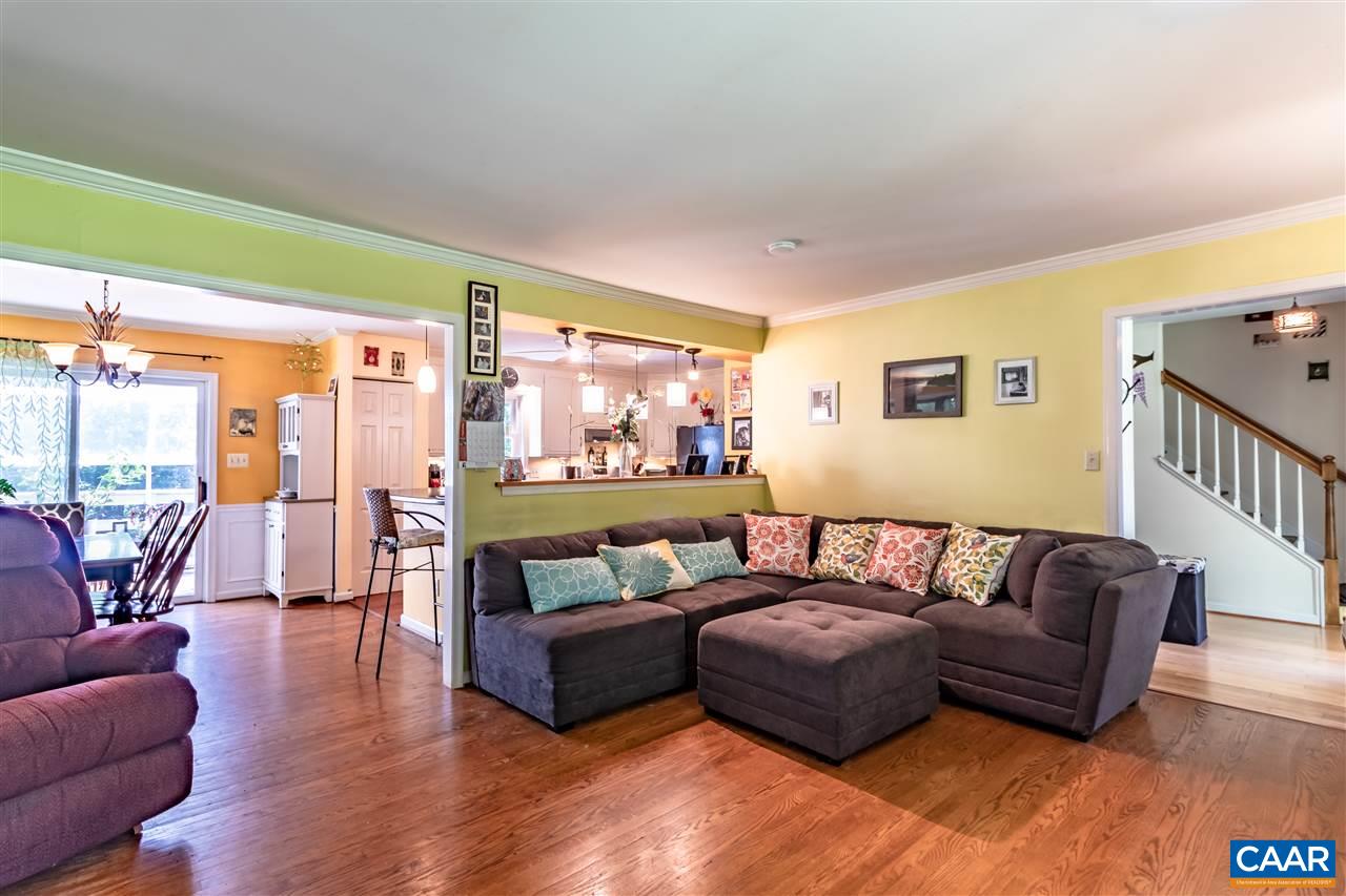 575 Gillums Ridge Road Charlottesville, VA 22903 - Photo 6 of 27 a living room with furniture and a large window