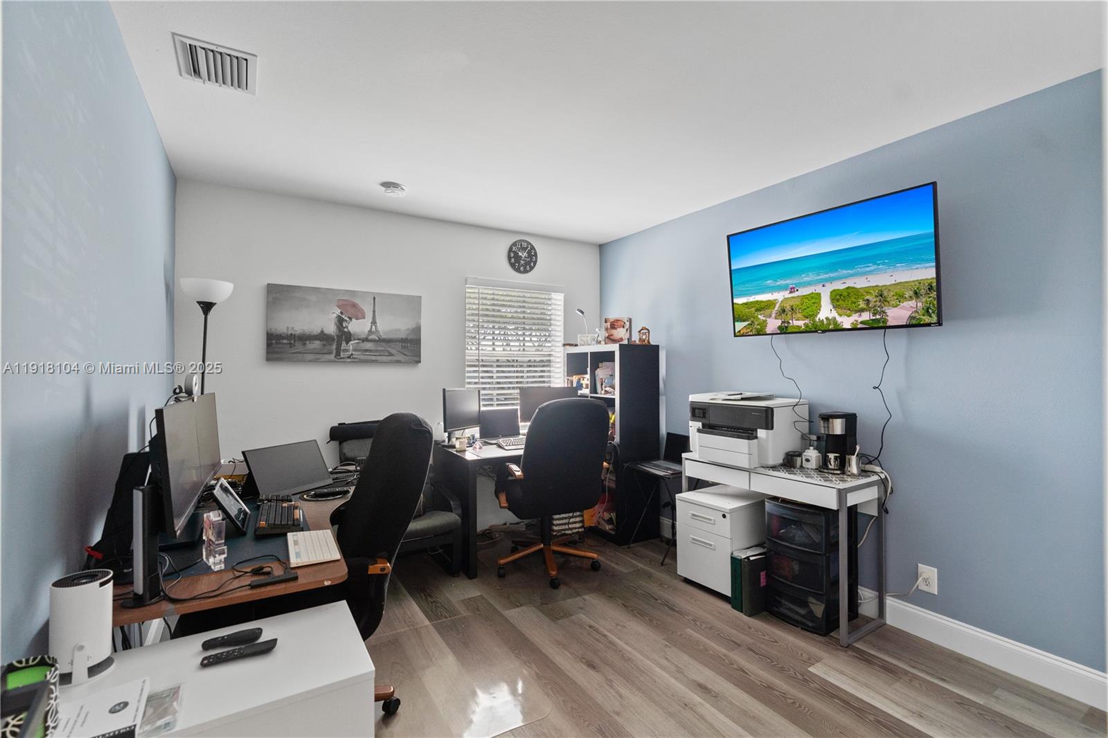8089 Southwest 18th Court, Unit 27 Davie, FL 33324 - Photo 20 of 36 a view of a workspace with furniture and a window