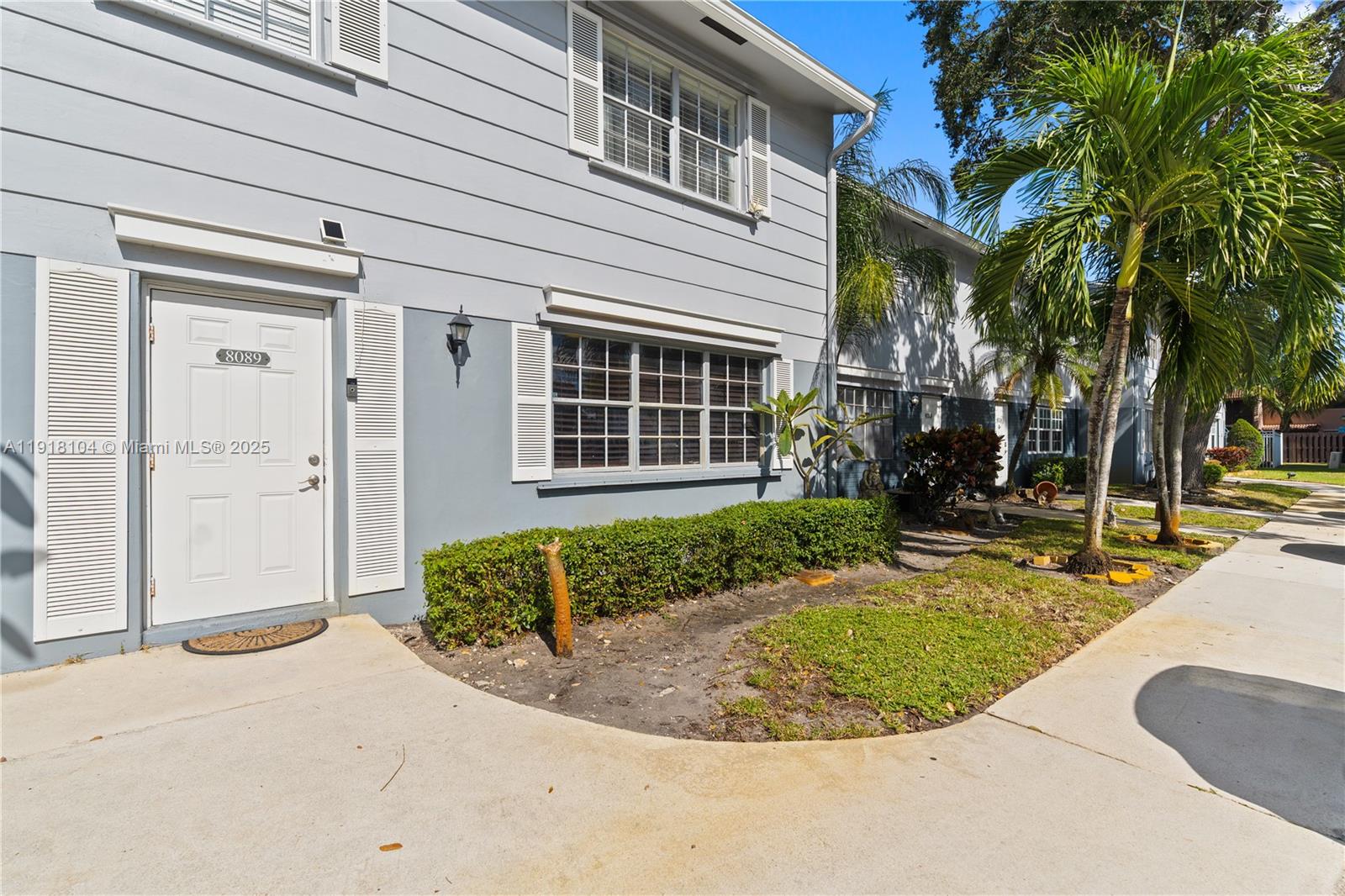 8089 Southwest 18th Court, Unit 27 Davie, FL 33324 - Photo 31 of 36 a view of a house with a backyard