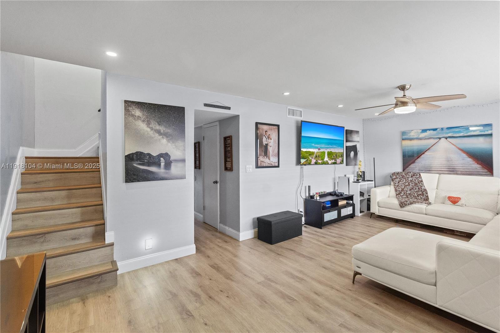 8089 Southwest 18th Court, Unit 27 Davie, FL 33324 - Photo 4 of 36 a living room with furniture and wooden floor