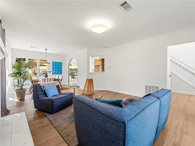 a living room with furniture and a couch