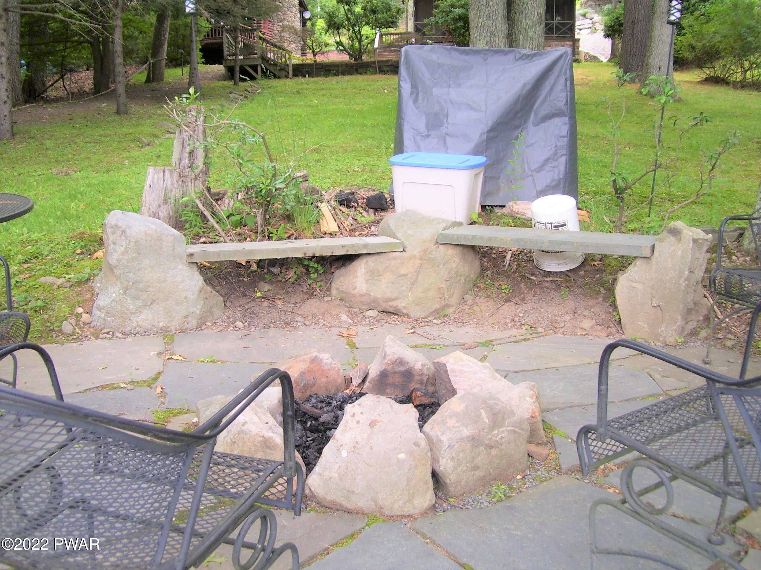 50 Paupack Point Road Hawley, PA 18428 - Photo 40 of 59 Patio by the Lake w/ Built in Fire Pit