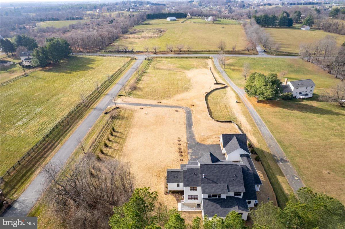39762 Rivers Edge Lane Lovettsville, VA 20180 - Photo 106 of 118 an aerial view of a swimming pool with outdoor seating and yard