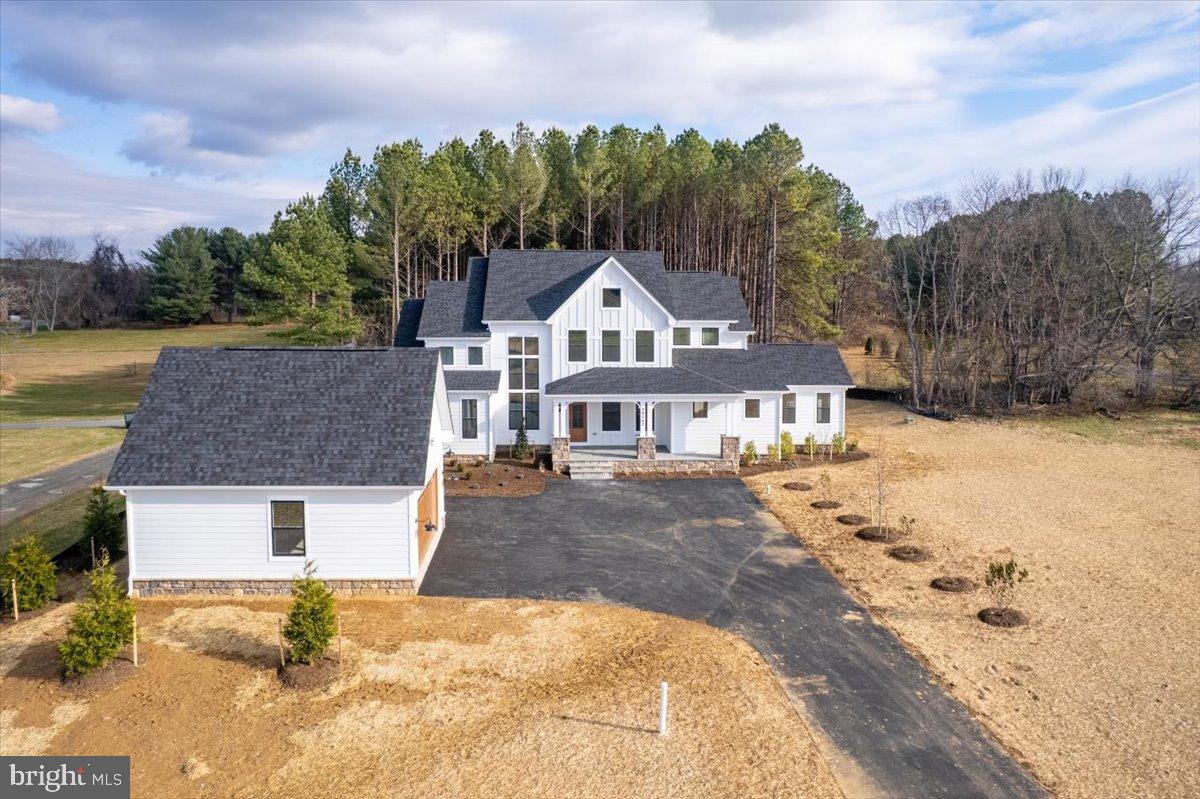 39762 Rivers Edge Lane Lovettsville, VA 20180 - Photo 115 of 118 Backyard privacy extends beyond the tree line.