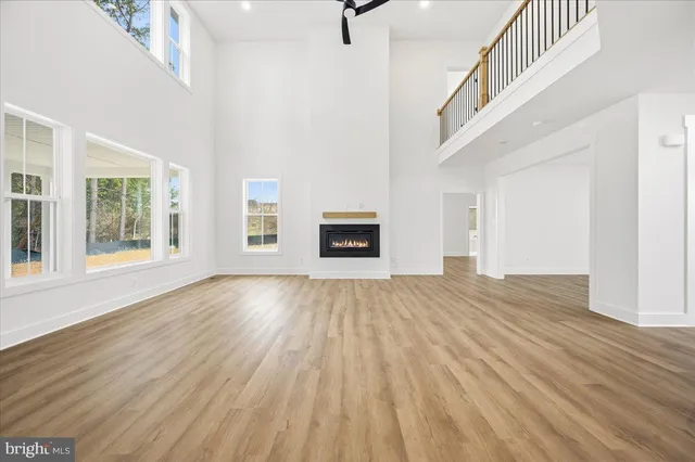 a view of a bathroom with wooden floor