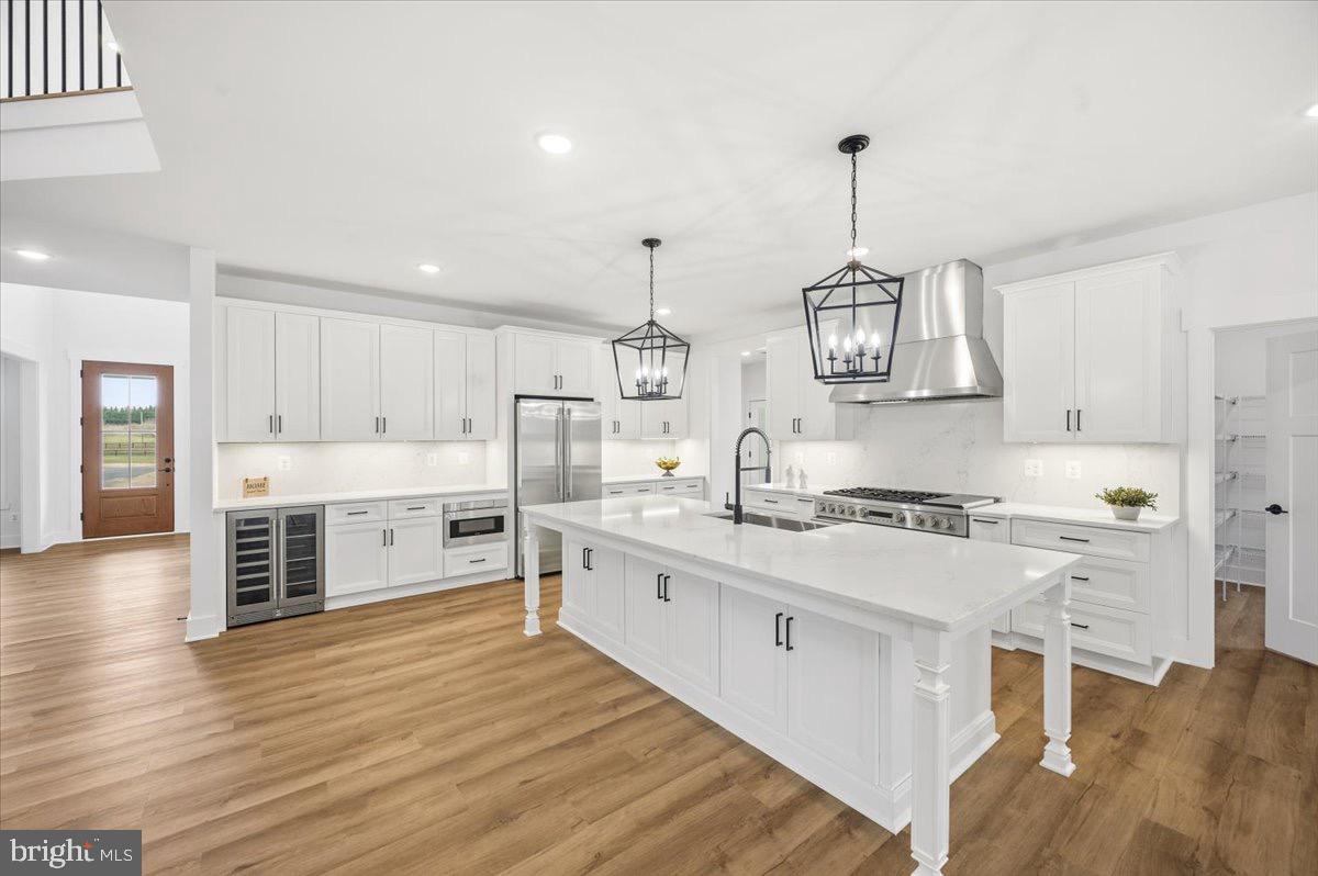 39762 Rivers Edge Lane Lovettsville, VA 20180 - Photo 32 of 118 Beverage refrigerator and built in microwave.