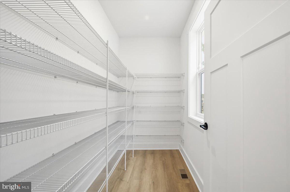 39762 Rivers Edge Lane Lovettsville, VA 20180 - Photo 45 of 118 a view of a room with racks on the wall