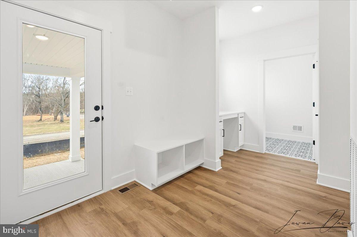 39762 Rivers Edge Lane Lovettsville, VA 20180 - Photo 49 of 118 Drop zone, Laundry Room, Powder Room & 2 closets.