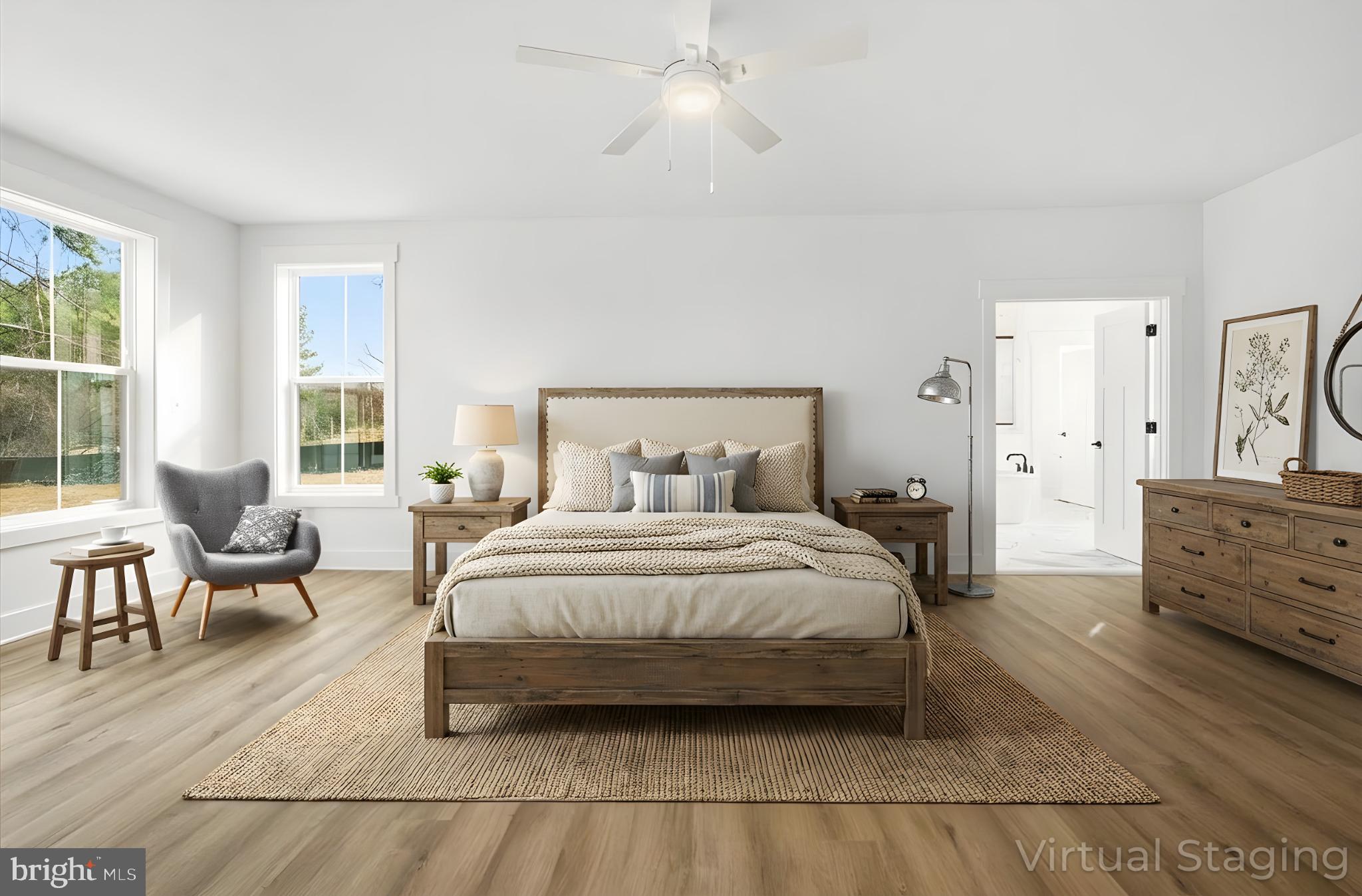39762 Rivers Edge Lane Lovettsville, VA 20180 - Photo 55 of 118 Virtually staged main level primary suite.