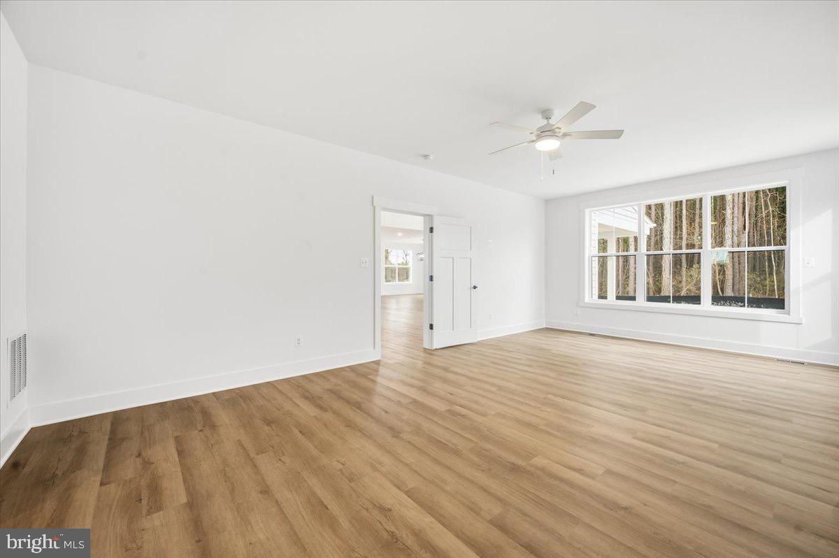 39762 Rivers Edge Lane Lovettsville, VA 20180 - Photo 57 of 118 wooden floor in an empty room