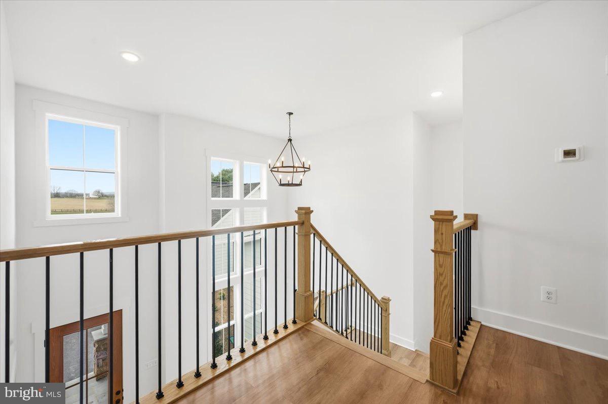 39762 Rivers Edge Lane Lovettsville, VA 20180 - Photo 74 of 118 a view of hallway with wooden floor