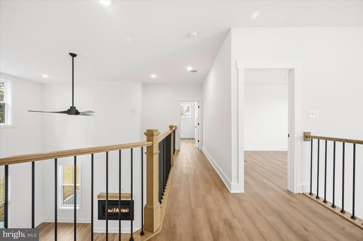 39762 Rivers Edge Lane Lovettsville, VA 20180 - Photo 75 of 118 a view of hallway with wooden floor