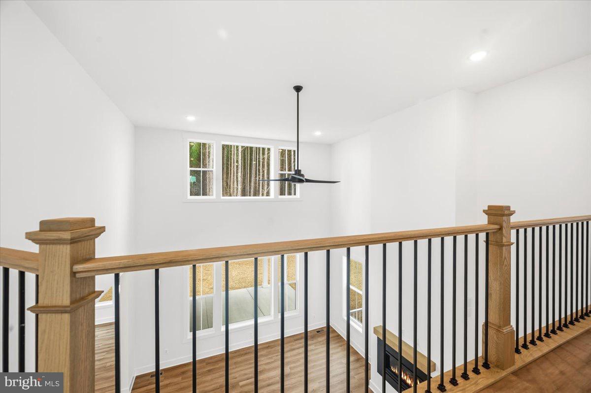39762 Rivers Edge Lane Lovettsville, VA 20180 - Photo 81 of 118 a view of a hallway with windows