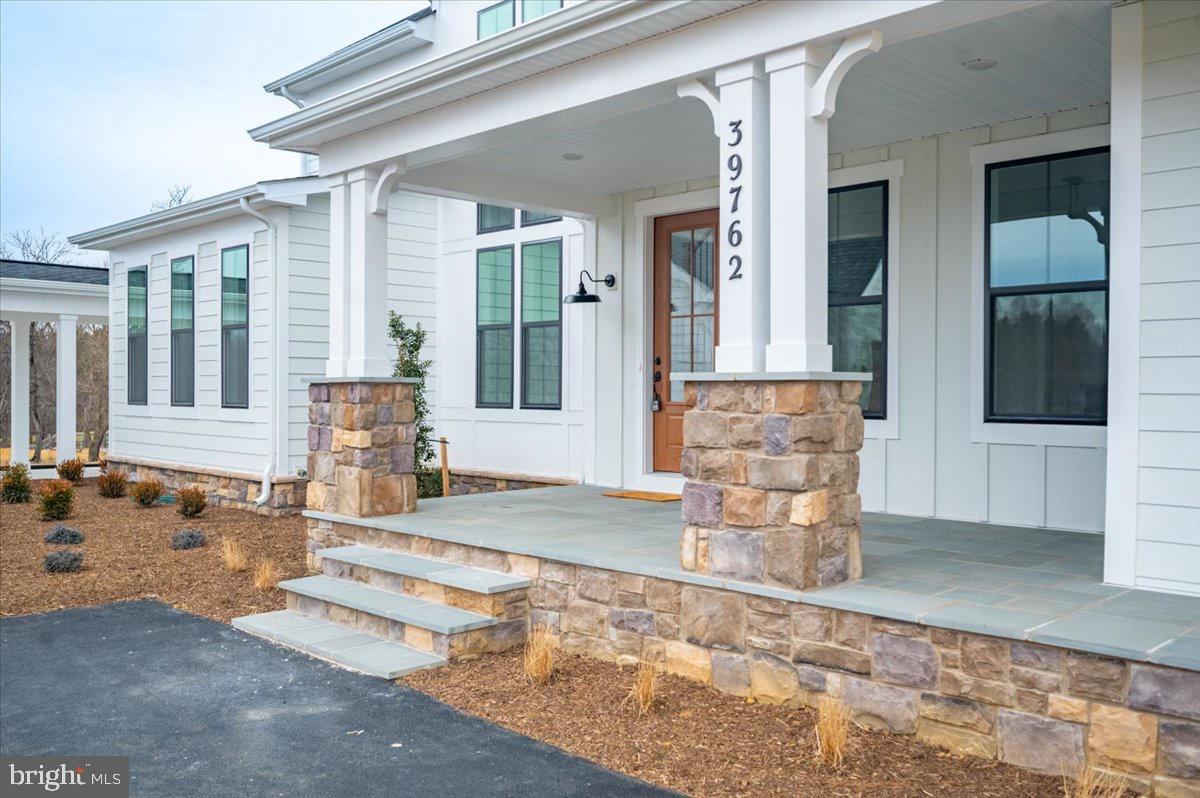 39762 Rivers Edge Lane Lovettsville, VA 20180 - Photo 9 of 118 Stone water table and columns.