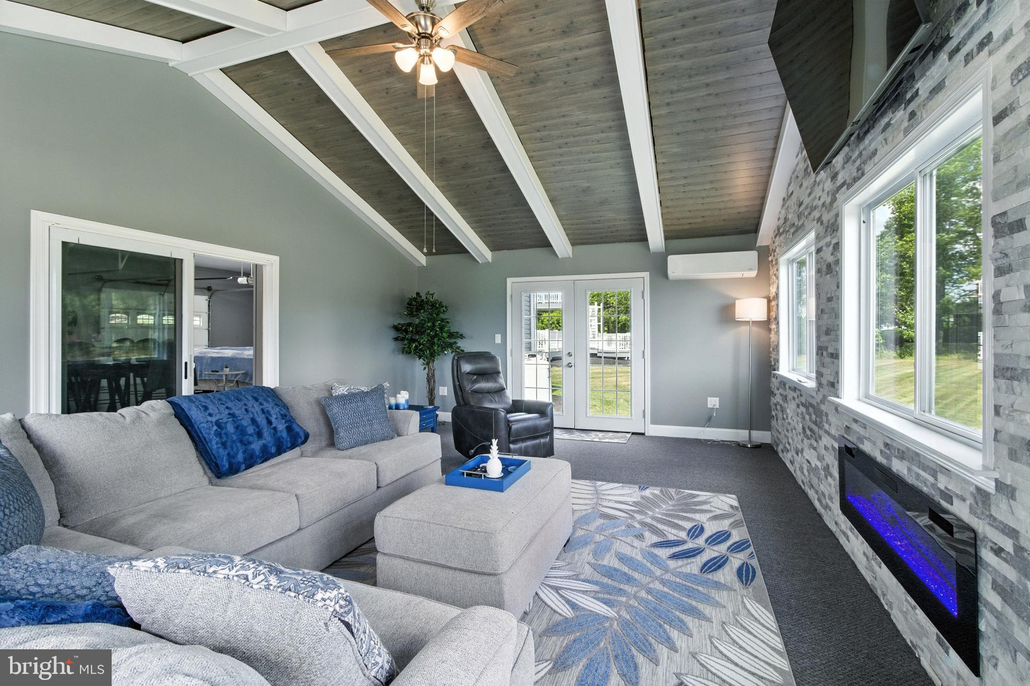 2230 Six Mile Road Philipsburg, PA 16866 - Photo 17 of 70 a living room with furniture and a large window