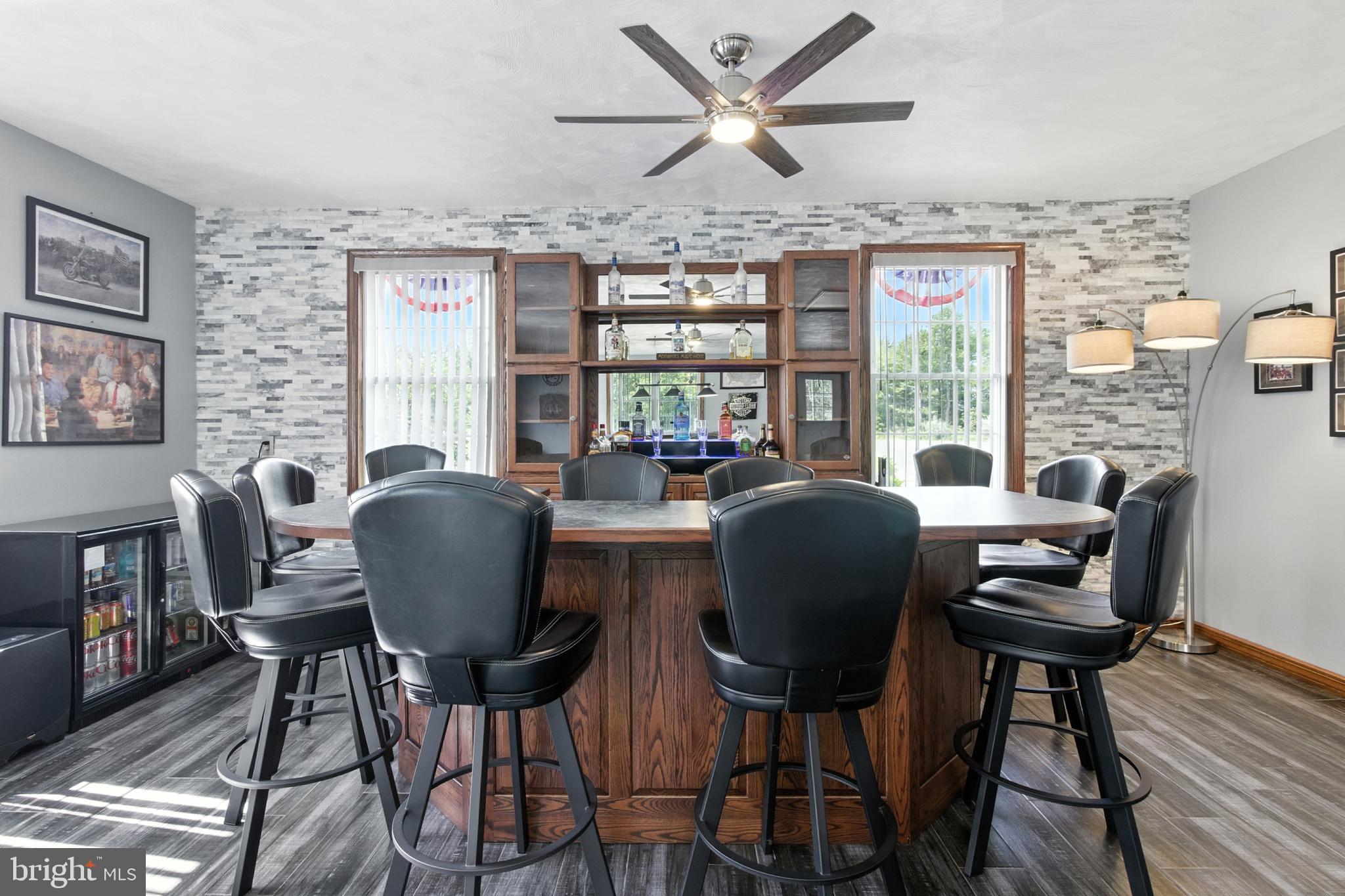 2230 Six Mile Road Philipsburg, PA 16866 - Photo 38 of 70 a dining room with furniture a window and wooden floor