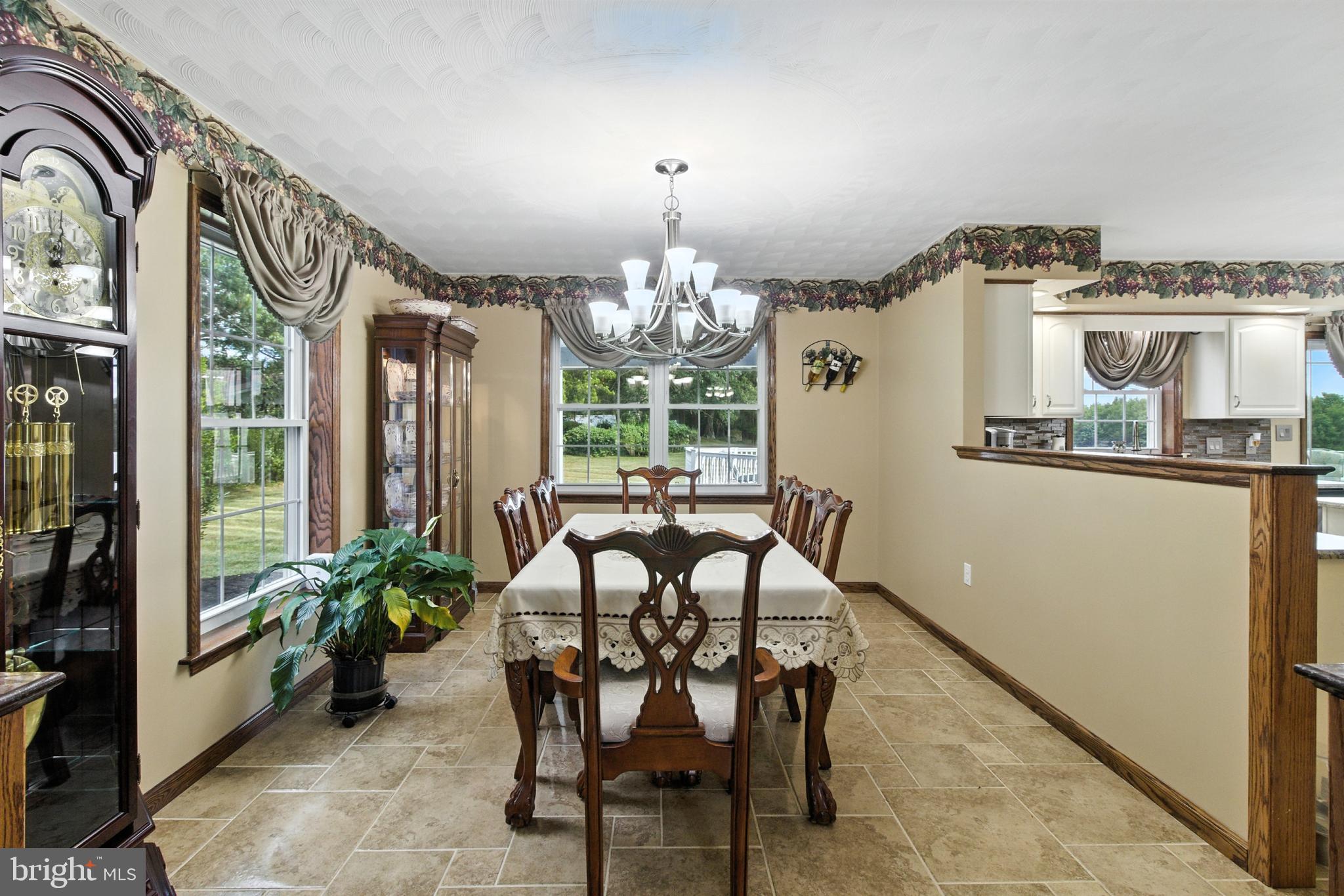 2230 Six Mile Road Philipsburg, PA 16866 - Photo 43 of 70 a view of a dining room with furniture and chandelier