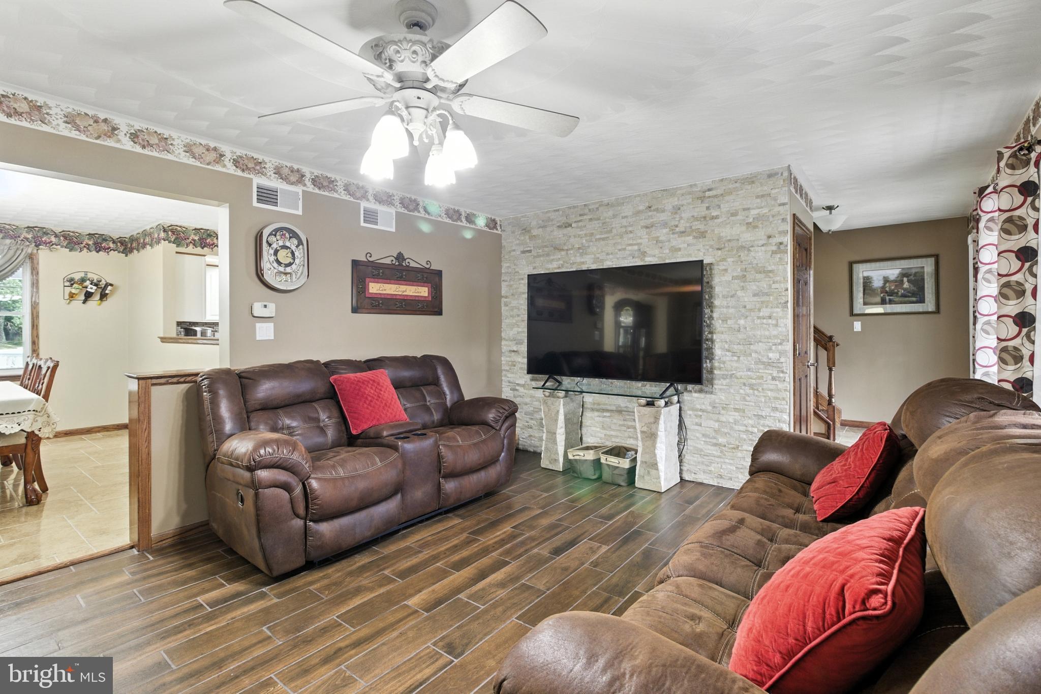 2230 Six Mile Road Philipsburg, PA 16866 - Photo 44 of 70 a living room with furniture and a flat screen tv