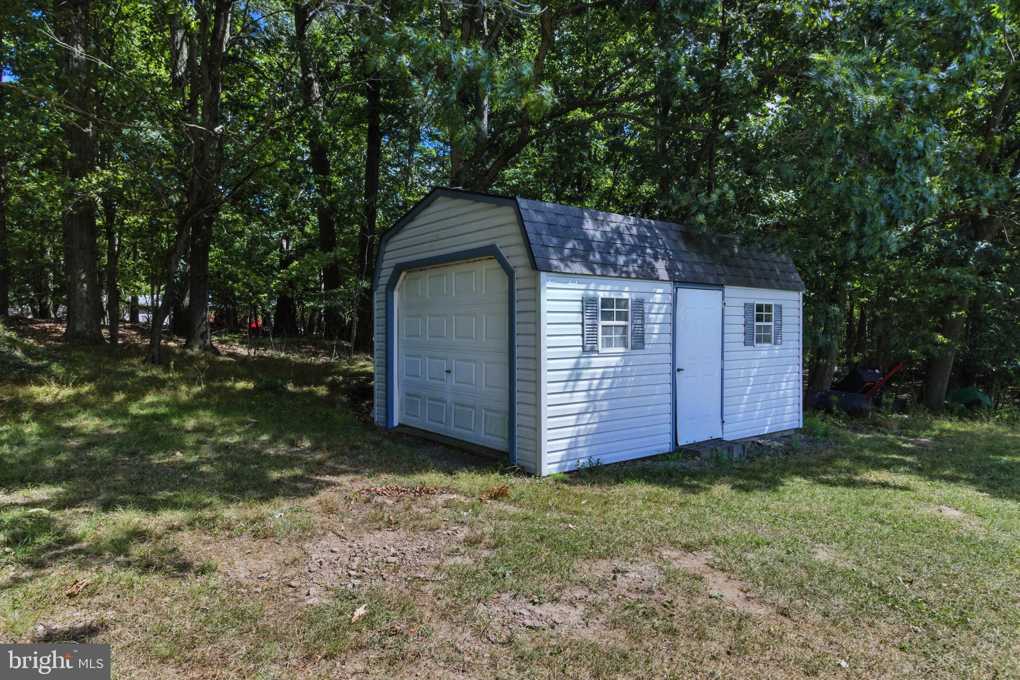 2230 Six Mile Road Philipsburg, PA 16866 - Photo 55 of 70 a view of a barn in the middle of a yard