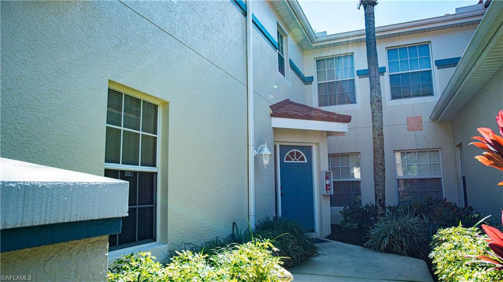 10711 Crooked River Road, Unit 202 Estero, FL 34135 - Photo 2 of 28 a view of front door of house