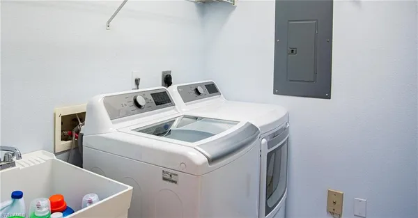 a utility room with dryer and washer