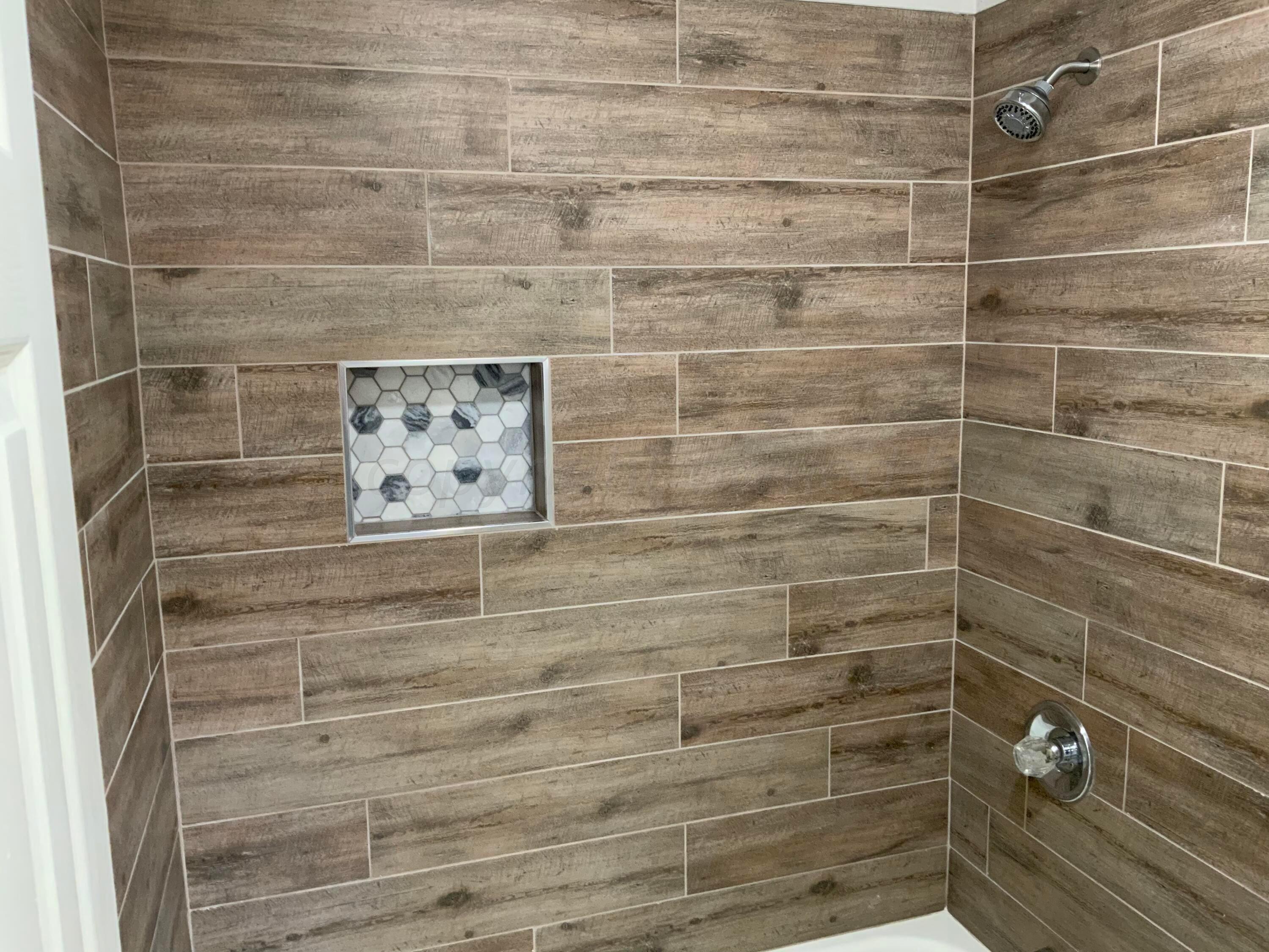 4616 South Rusk Street Amarillo, TX 79110 - Photo 12 of 25 a bathroom with a shower