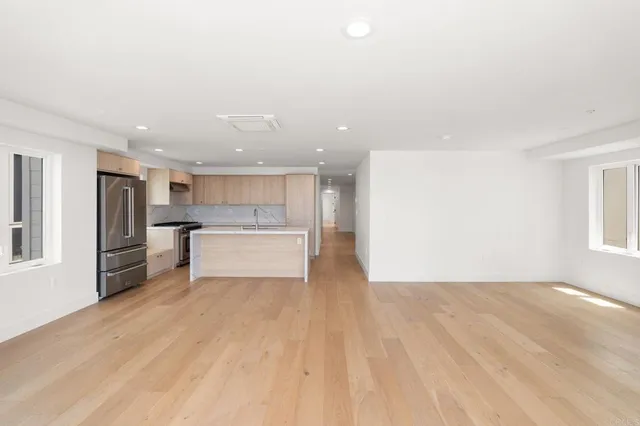 a view of kitchen with wooden floor