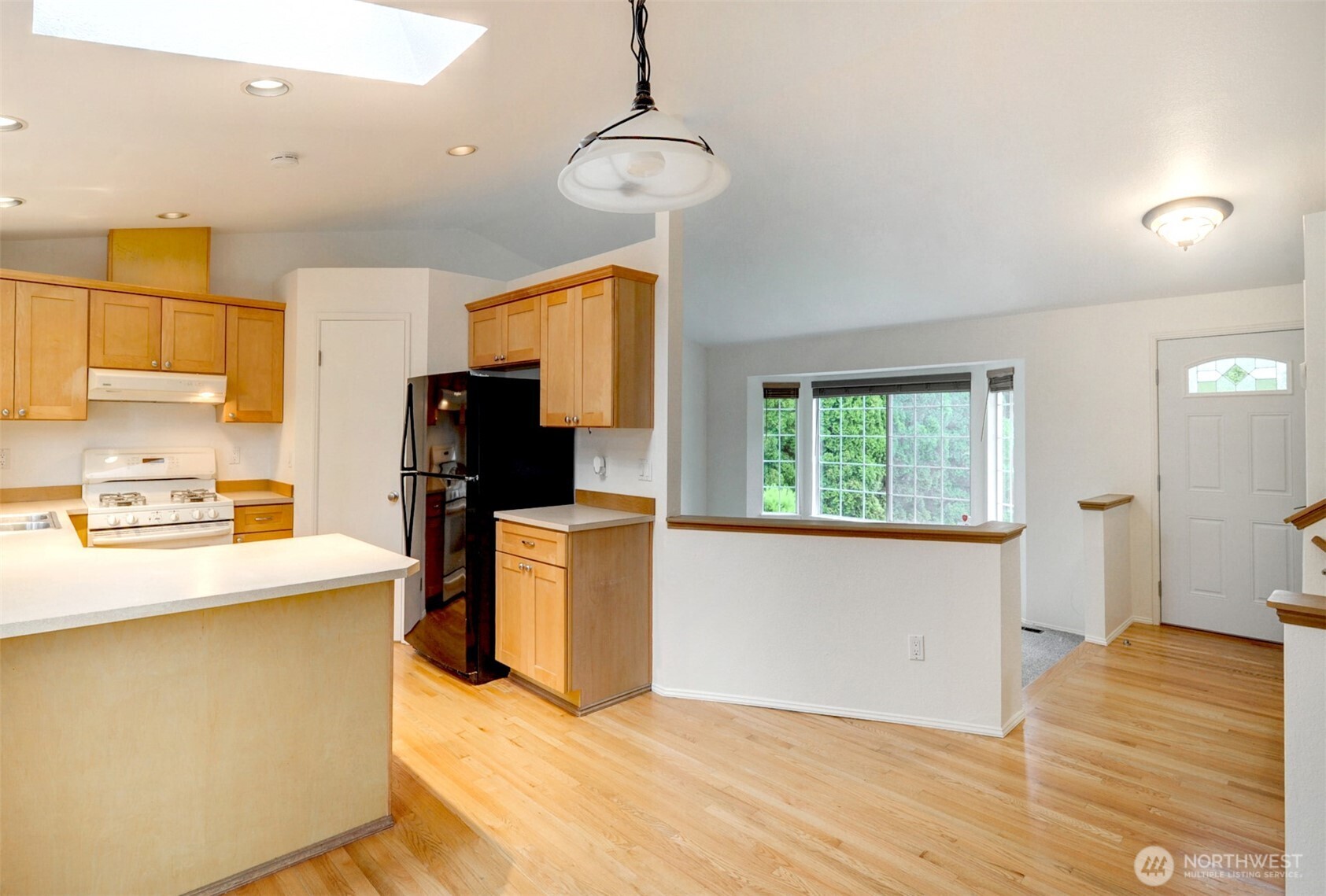 532 198th Street Southeast Bothell, WA 98012 - Photo 9 of 22 a kitchen that has a sink and a stove top oven
