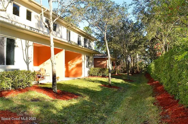 a view of swimming pool with an outdoor seating