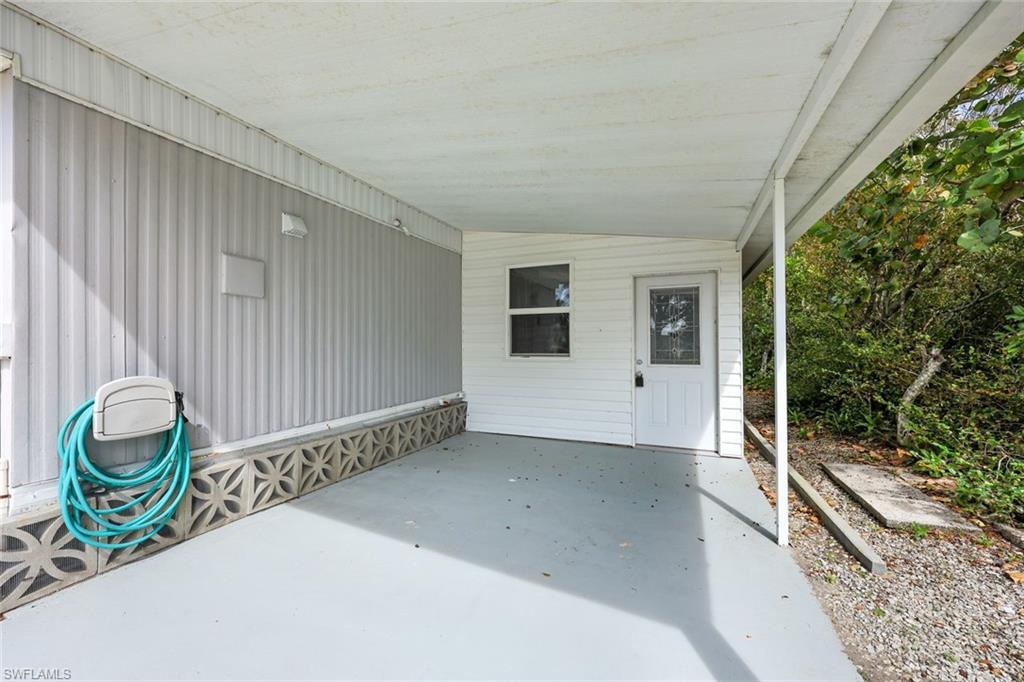 171 Grassy Key Lane, Unit 48 Naples, FL 34114 - Photo 18 of 19 a view of entryway