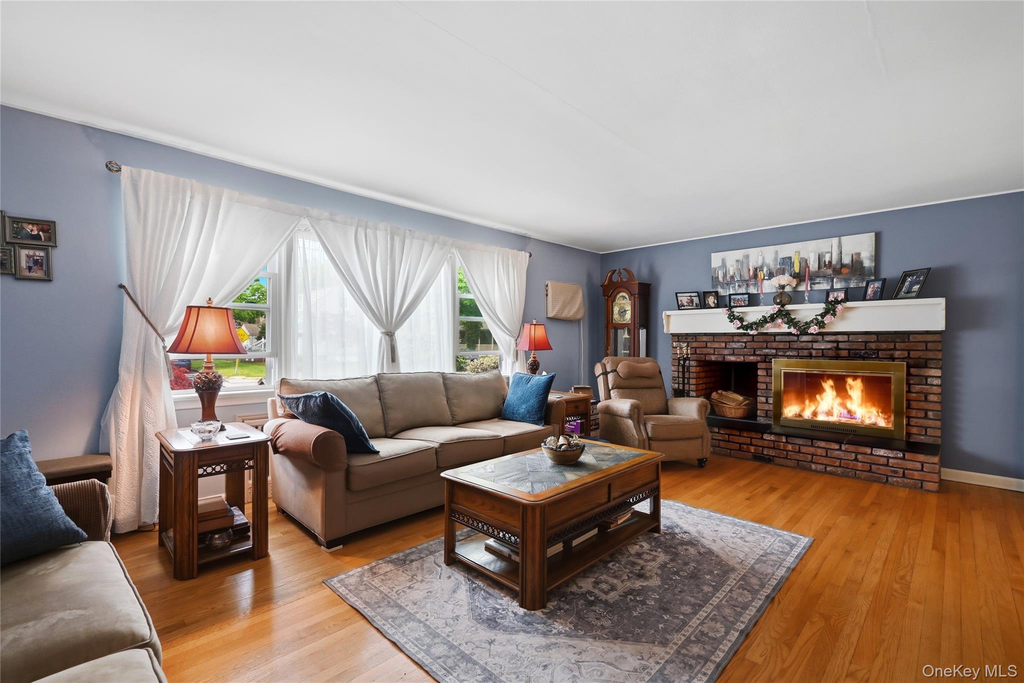 41 Lane Street Lindenhurst, NY 11757 - Photo 8 of 35 Hardwood floors and a wood burning fireplace