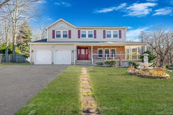 $690,000 | 211 North Titmus Drive, Mastic, NY 11950