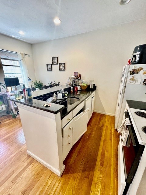 17 Thacher Street, Unit 3 Boston, MA 02113 - Photo 8 of 24 a kitchen with counter top space and appliances