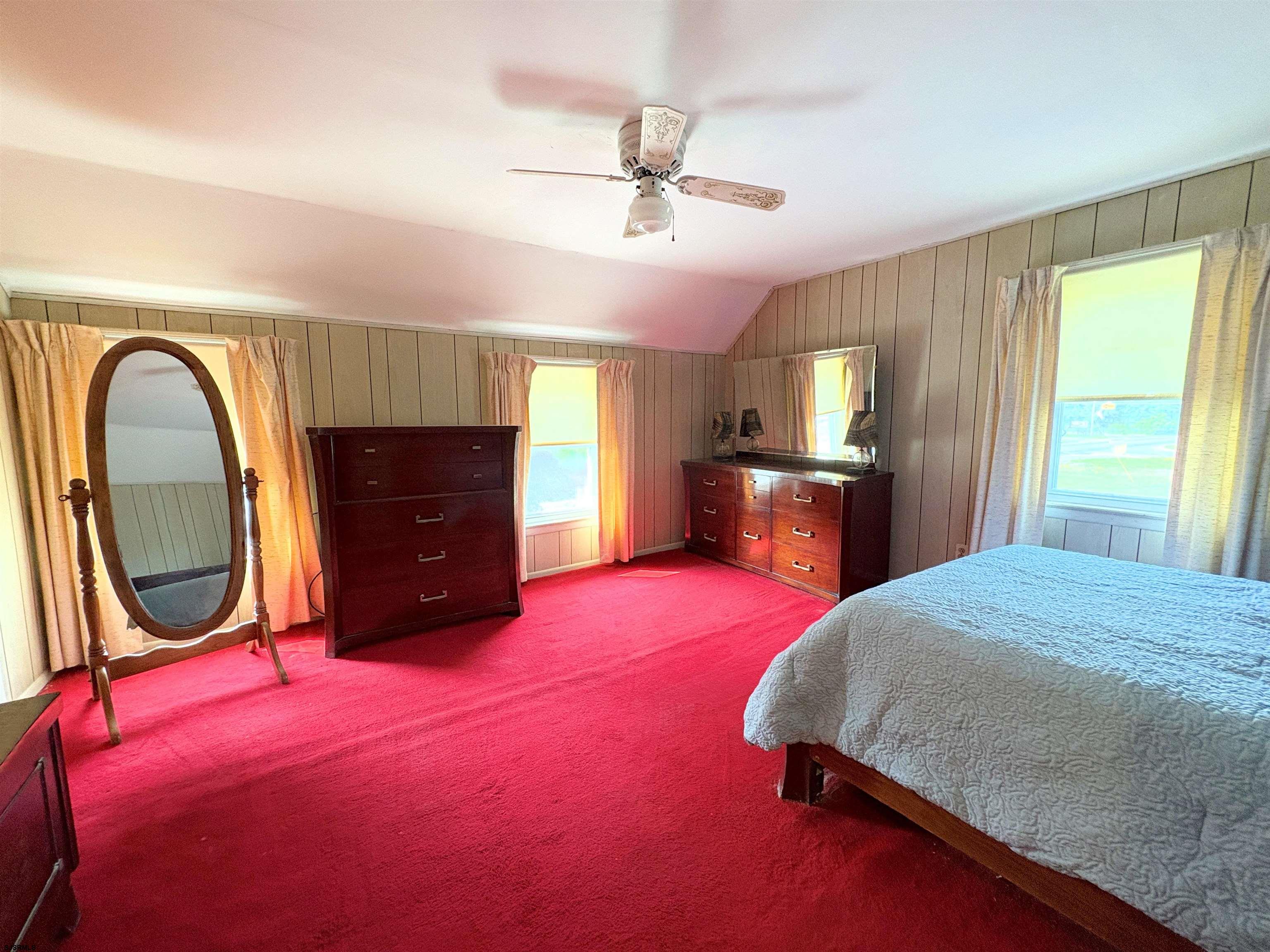 301 Broad Street Milmay, NJ 08330 - Photo 23 of 64 a bedroom with a bed and a dresser