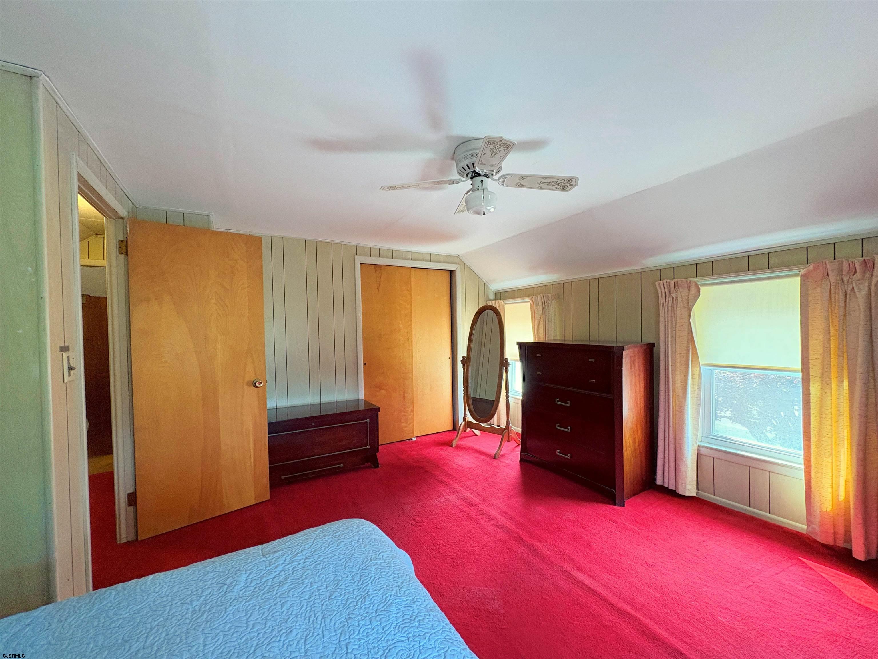 301 Broad Street Milmay, NJ 08330 - Photo 26 of 64 a living room with furniture and a flat screen tv