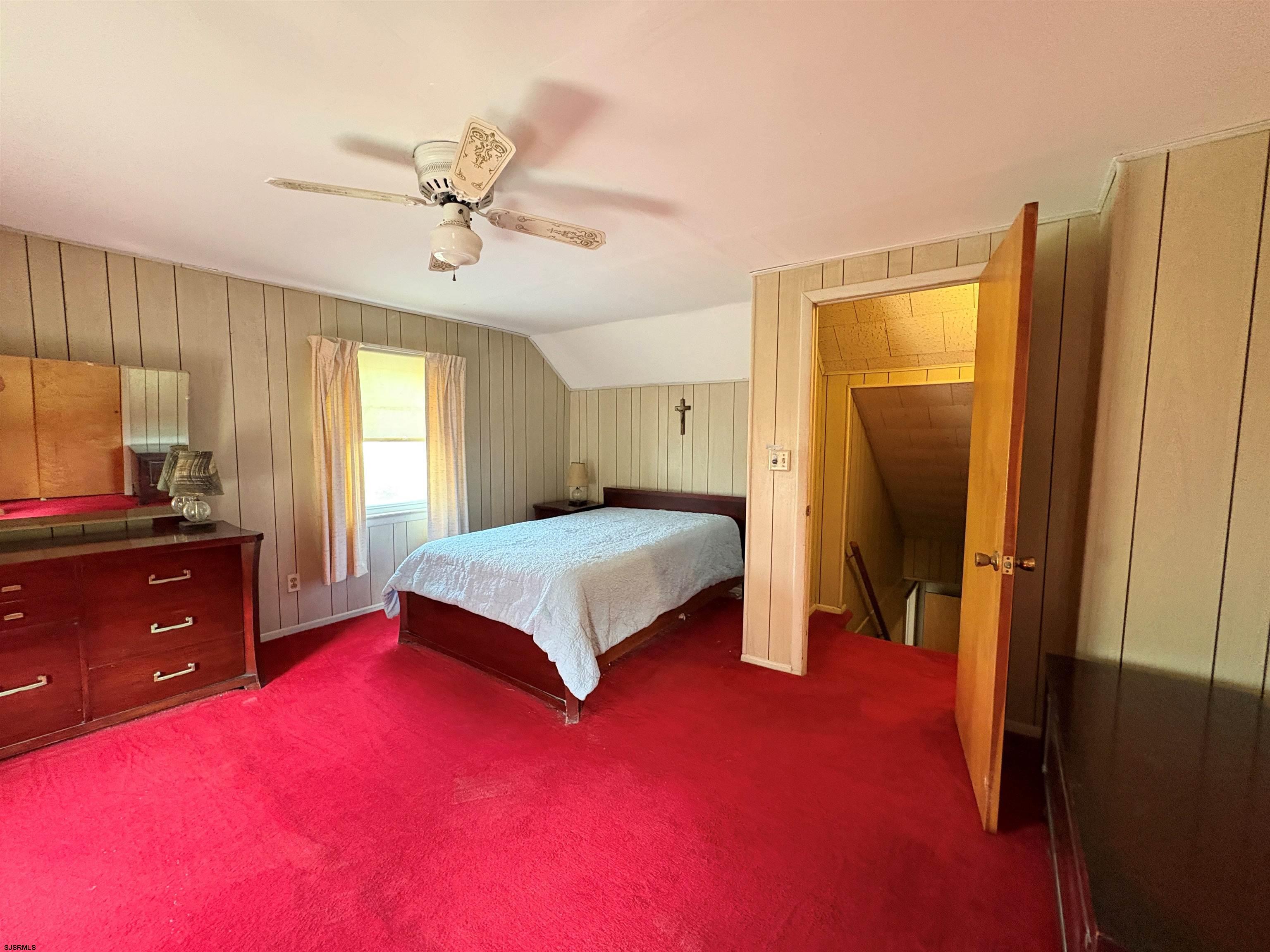 301 Broad Street Milmay, NJ 08330 - Photo 27 of 64 a bedroom with a bed and a dresser