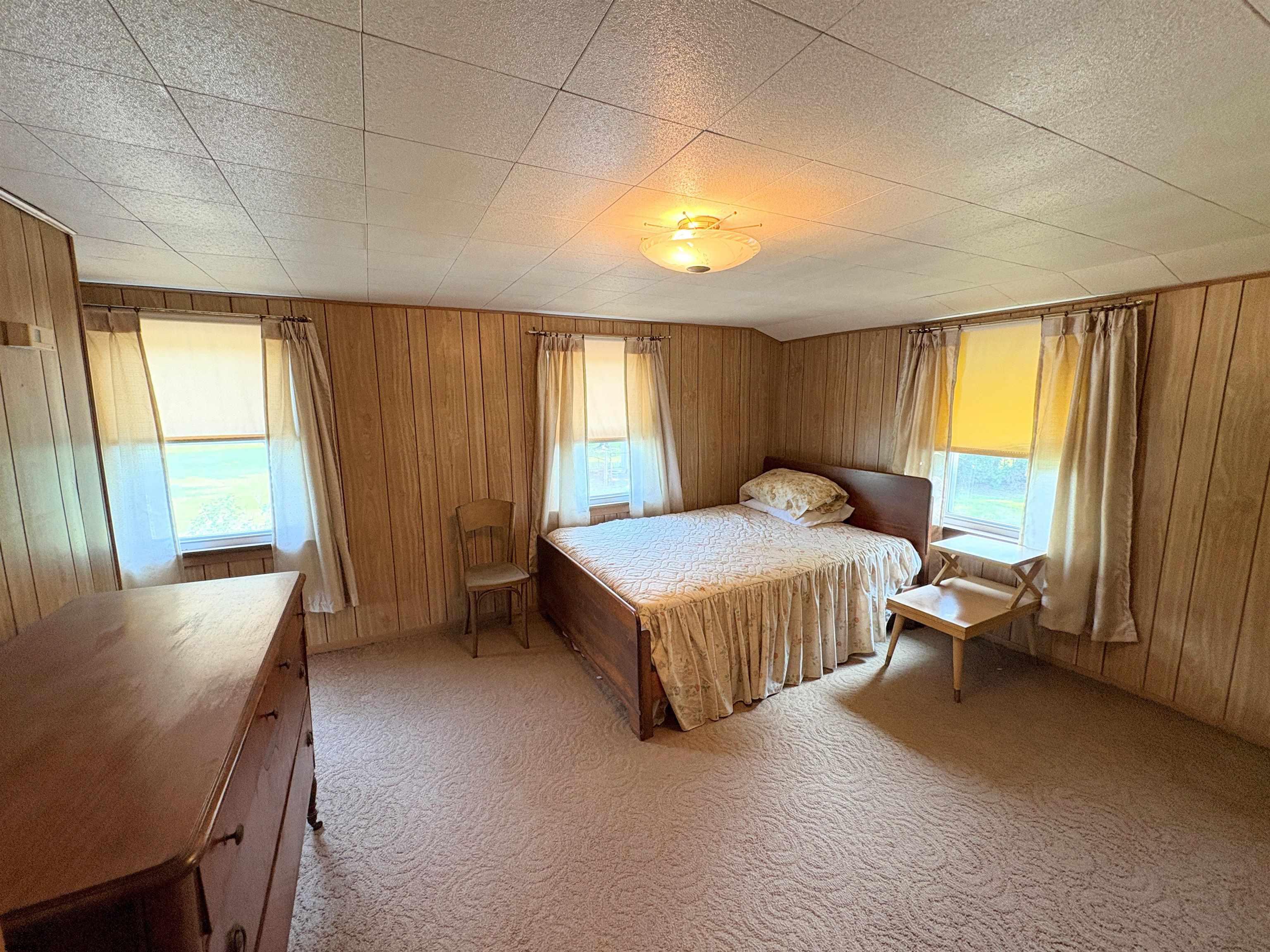 301 Broad Street Milmay, NJ 08330 - Photo 28 of 64 a spacious bedroom with a bed and a window