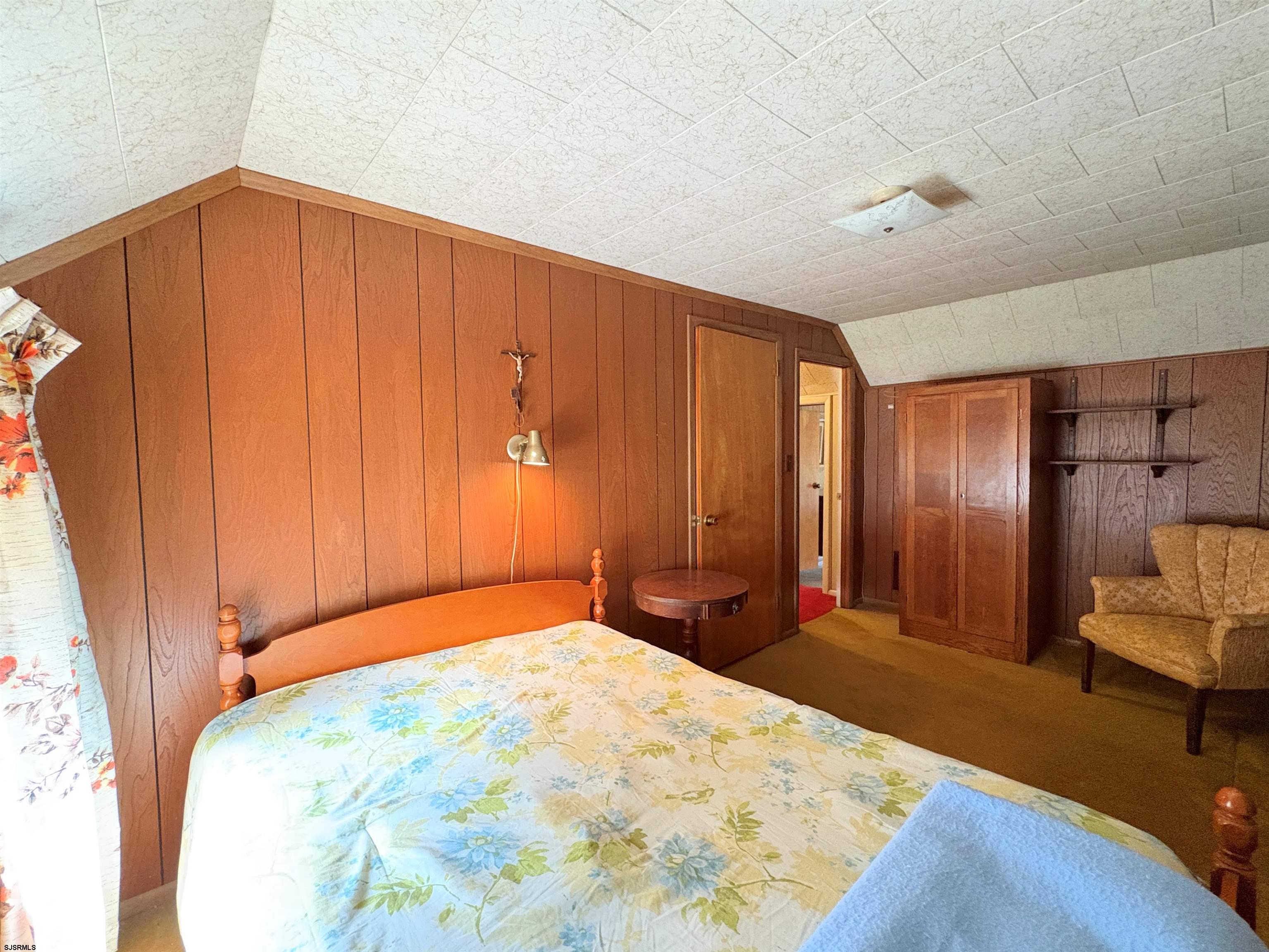 301 Broad Street Milmay, NJ 08330 - Photo 35 of 64 a bedroom with a bed and a mirror