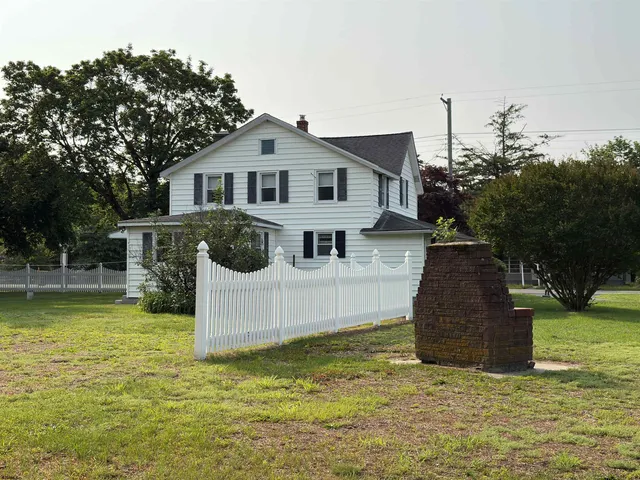 a view of a house with a big yard