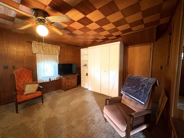 a view of empty room with fireplace