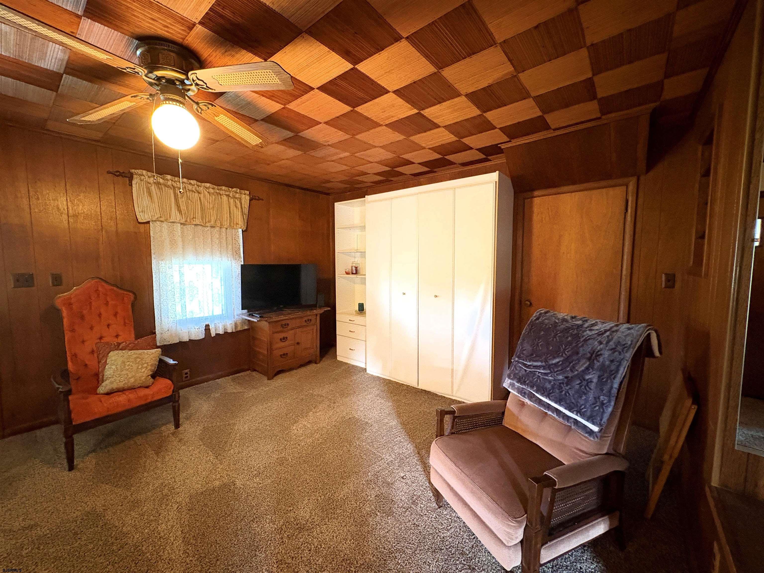 301 Broad Street Milmay, NJ 08330 - Photo 7 of 64 a living room with furniture and a window