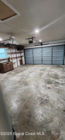 a kitchen with a sink a stove and cabinets