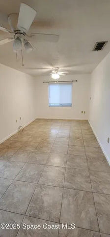 a view of a room with an empty space