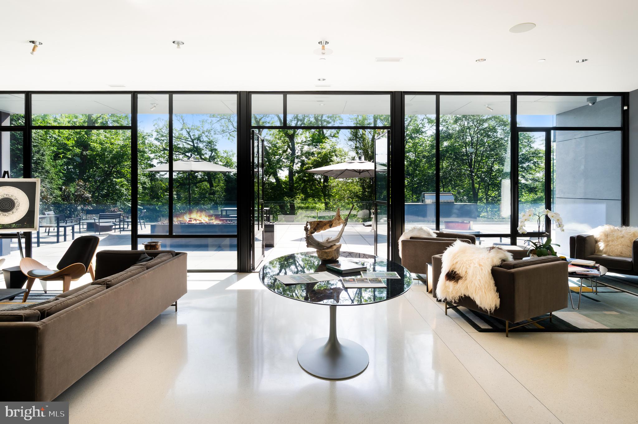 5124 Wissioming Road Bethesda, MD 20816 - Photo 13 of 49 a living room with couches and a large window