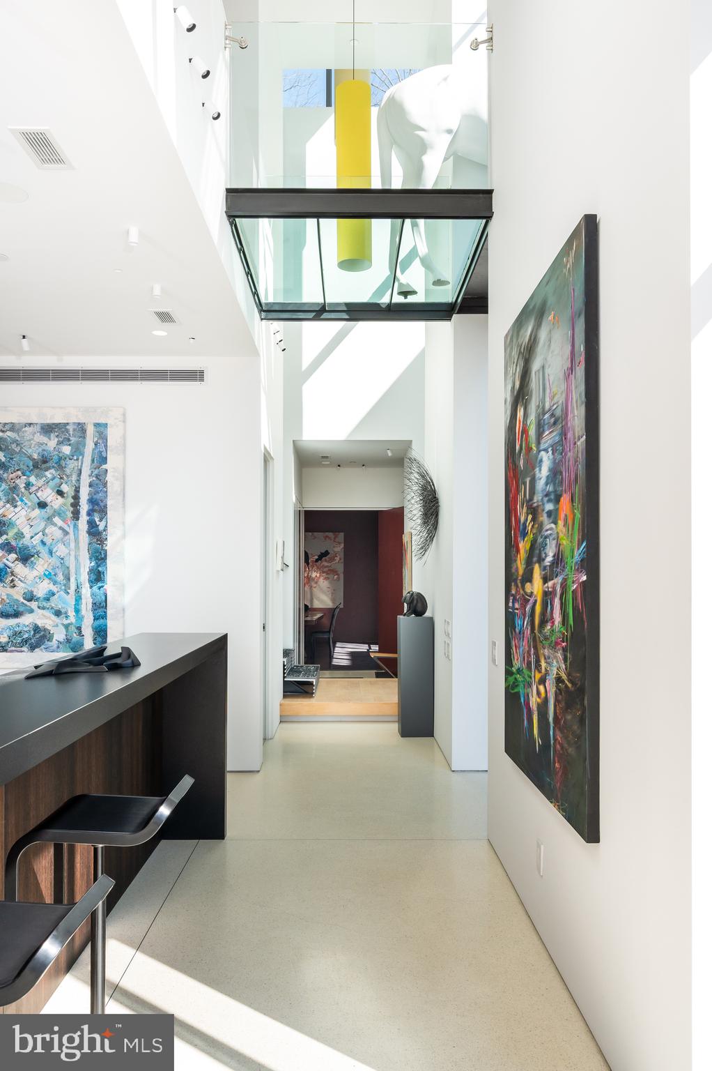 5124 Wissioming Road Bethesda, MD 20816 - Photo 19 of 49 a view of a hallway with workspace