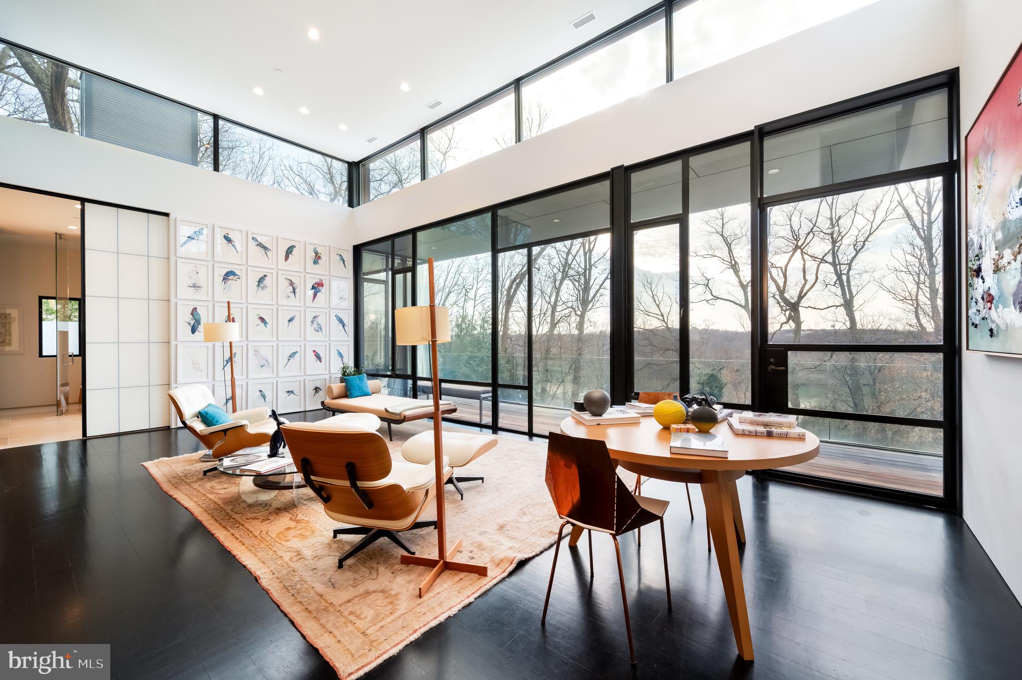 5124 Wissioming Road Bethesda, MD 20816 - Photo 26 of 49 a living room with furniture and a large window