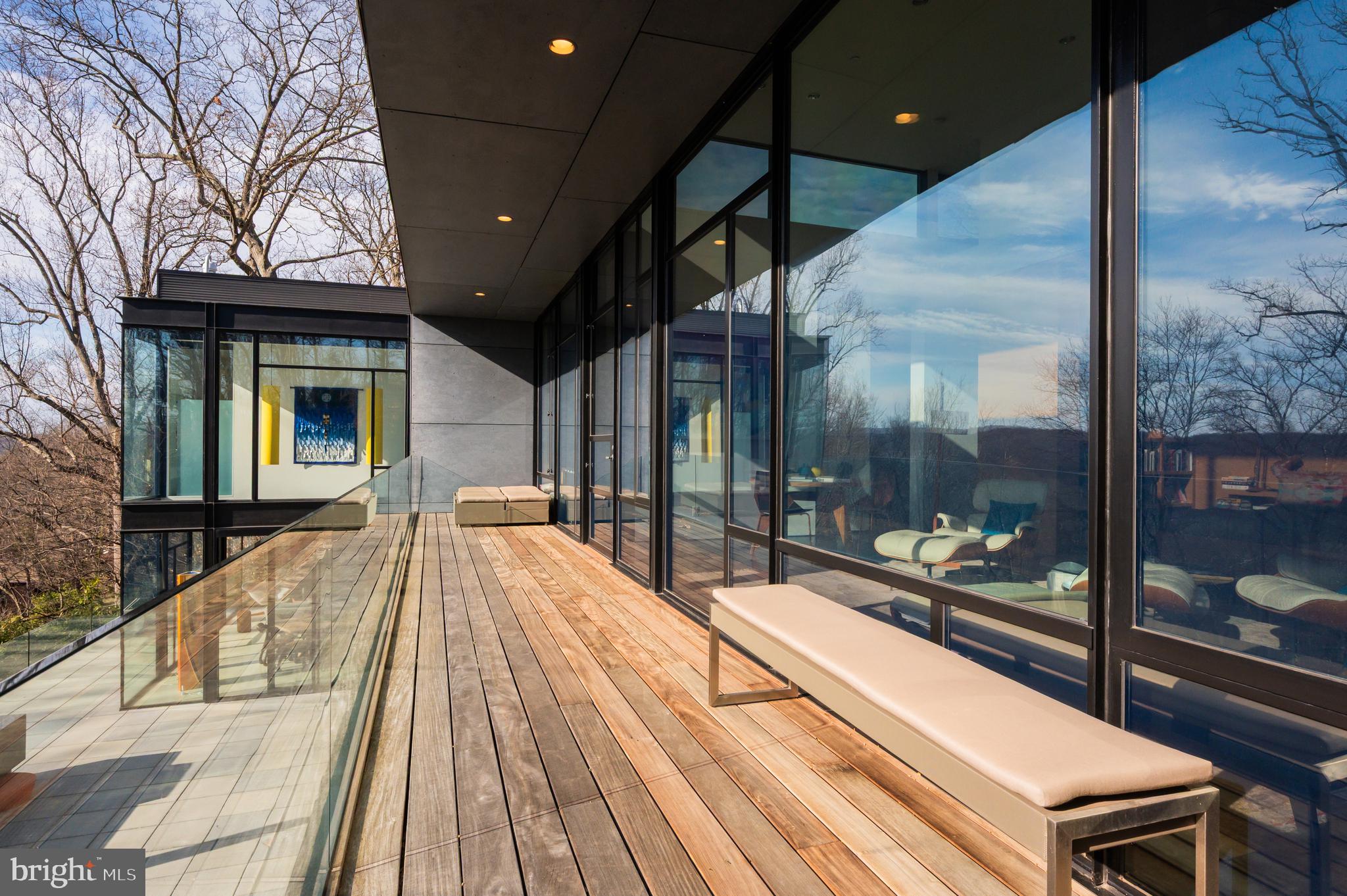 5124 Wissioming Road Bethesda, MD 20816 - Photo 29 of 49 a view of a balcony with dining area
