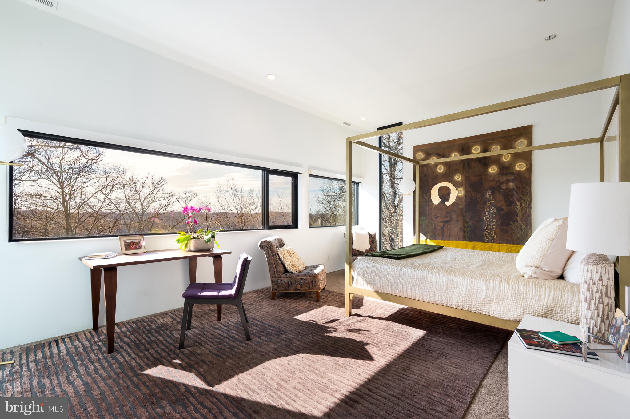 5124 Wissioming Road Bethesda, MD 20816 - Photo 30 of 49 a living room with furniture and a large window