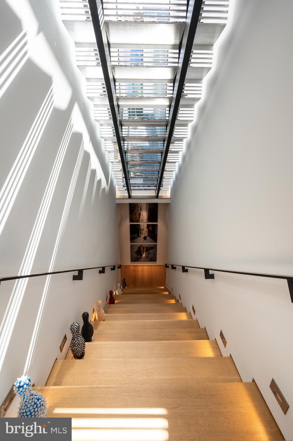 5124 Wissioming Road Bethesda, MD 20816 - Photo 31 of 49 a bedroom with a bed and a large window