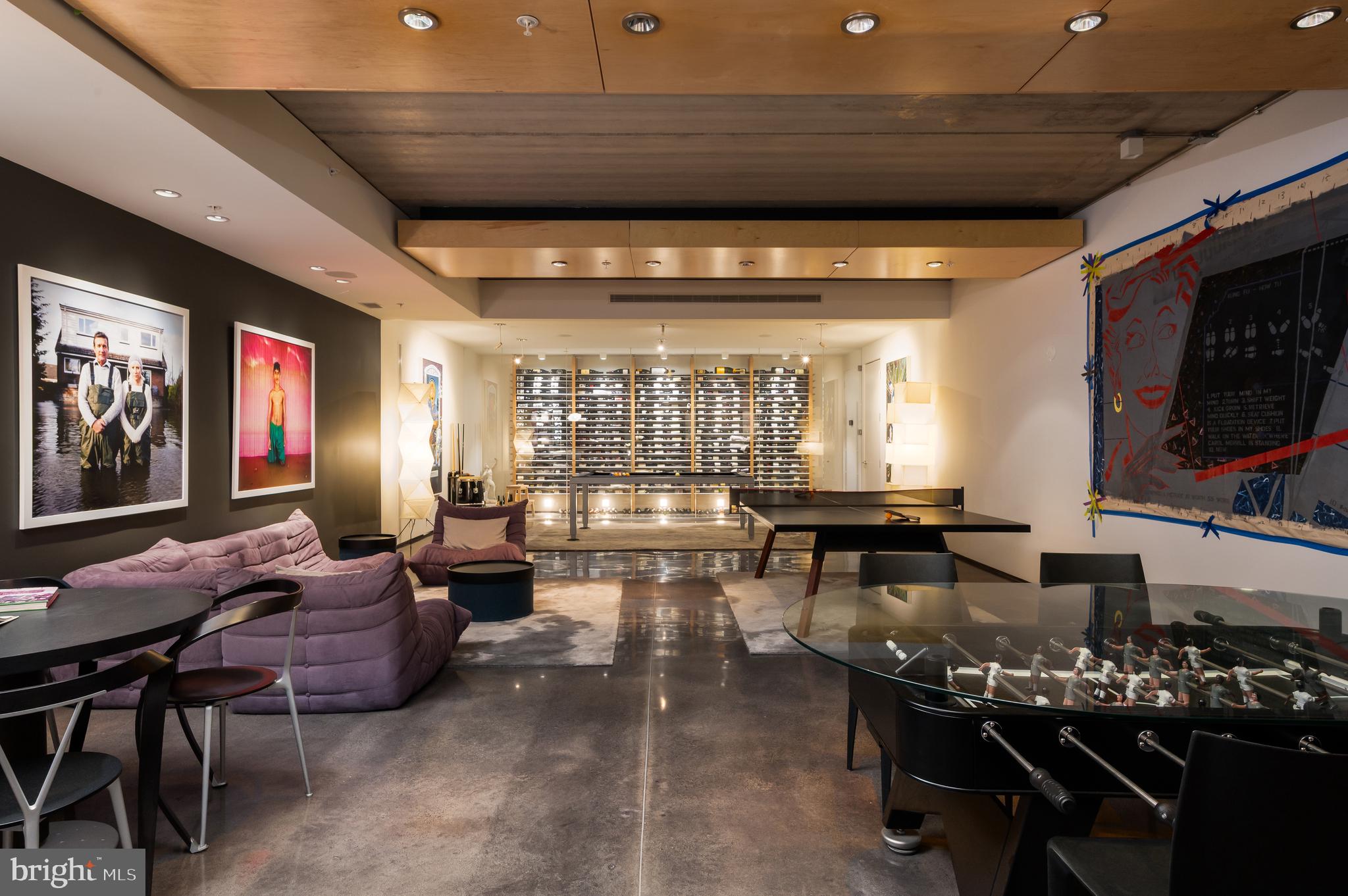 5124 Wissioming Road Bethesda, MD 20816 - Photo 32 of 49 a living room with furniture and a flat screen tv